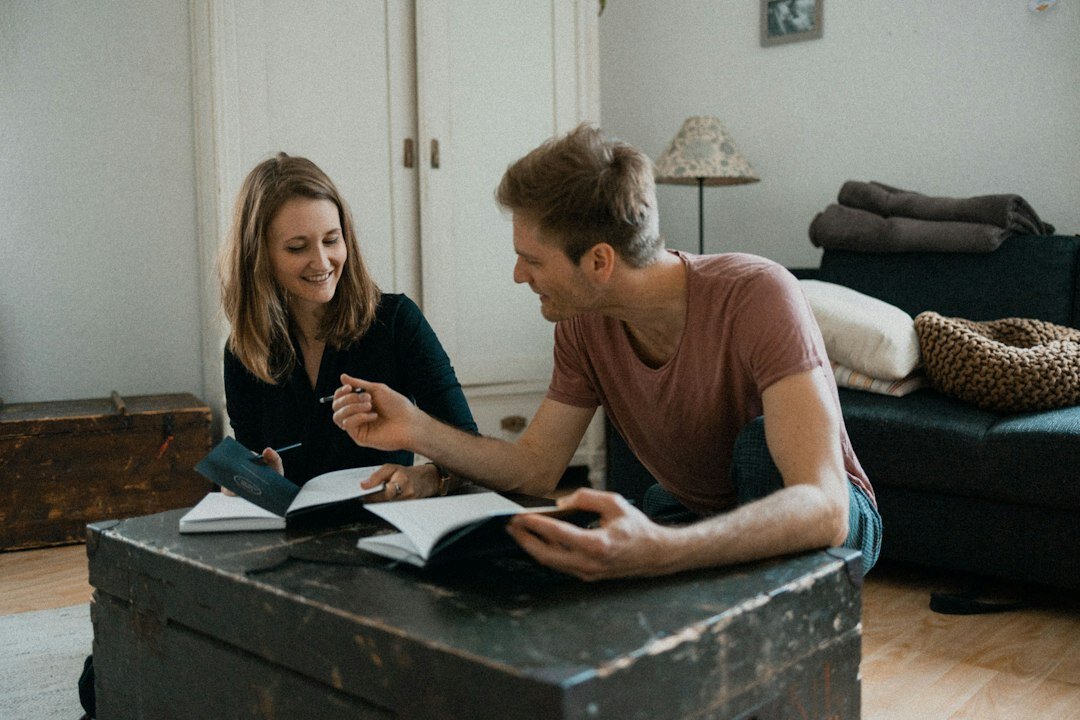 happy couple reviewing documents